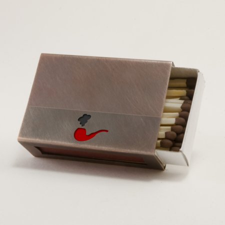 Streichholzschachtel - Huelle aus Kupfer mit roter Pfeife
