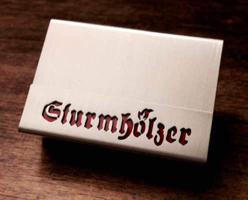 Hülle für Streichholzschachteln mit dem Schriftzug "Sturmhölzer"