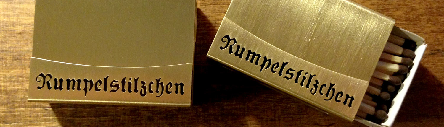 Streichholzschachtel-Etuis aus Messing mit dem Text "Rumpelstilzchen"